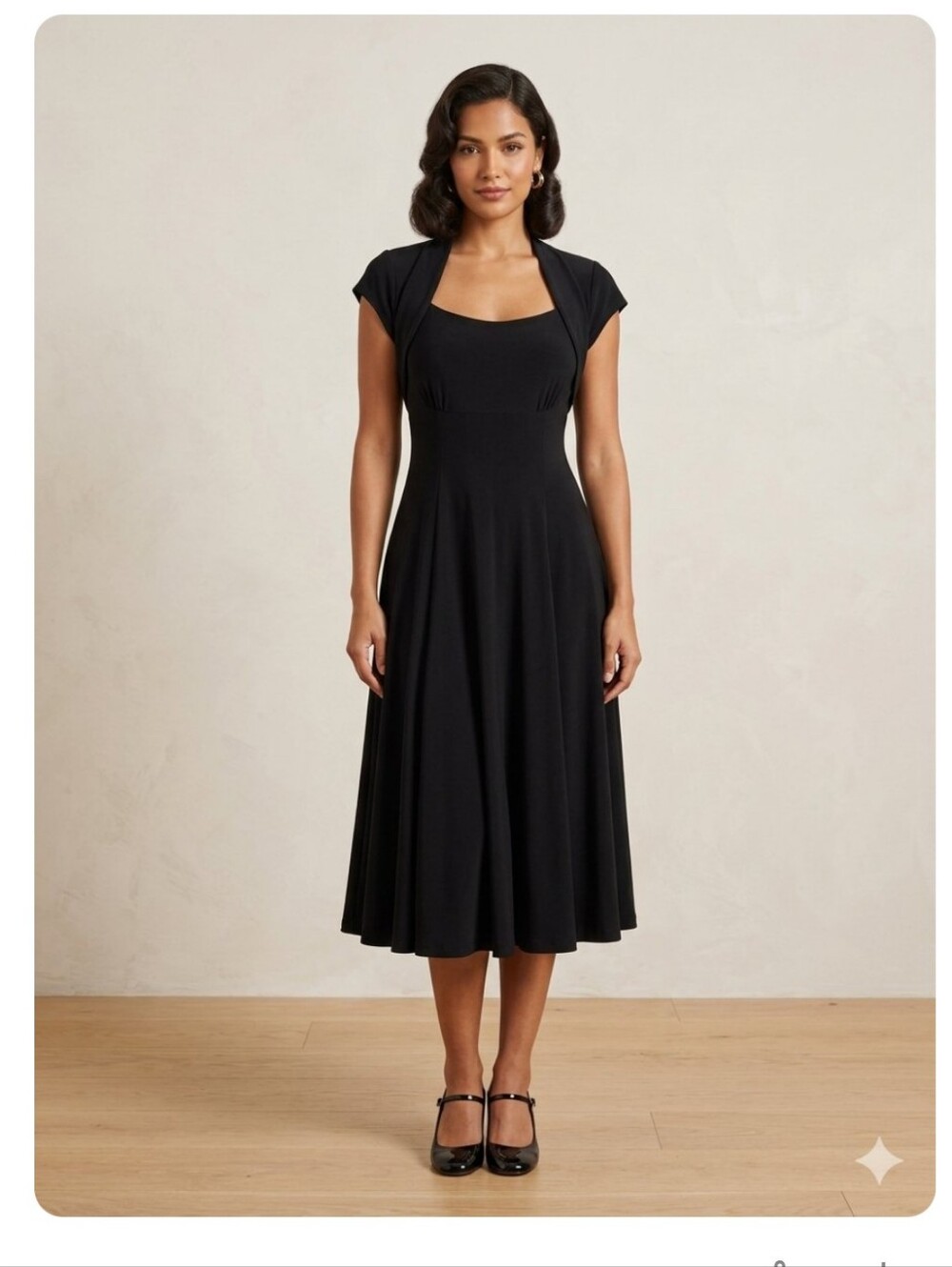 Norma Kamali Black Jersey Shrug-Style Swing Dress